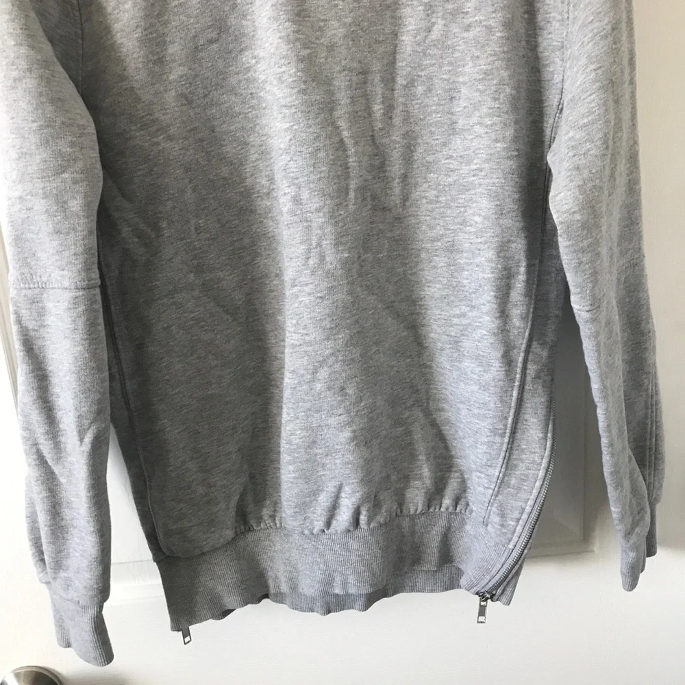 Divided cotton blend gray long sleeve sweater with side zippers